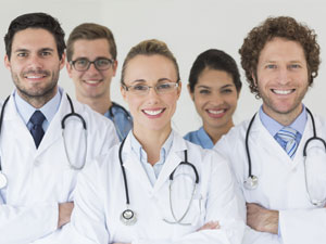 Group of doctors smiling at the camera.